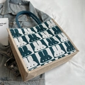 Plaid canvas tote bag with rabbit patterns and deep blue handles for daily commute - Blue