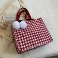 Red houndstooth tote bag with plush pom-pom charms and premium fabric handles - Red