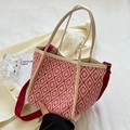 Chic red and white geometric bucket bag with wide strap and white leather handles - Red