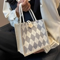 Gray and beige diamond lattice canvas handbag with white rope handles and button detail - Light Gray
