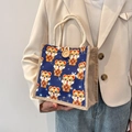 Cute dark blue linen handbag featuring cartoon tiger pattern and wood button closure - Dark Blue