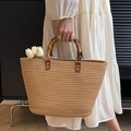 Summer woven straw tote bag with bamboo handles and elegant leather accents for beach travel - Khaki