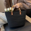 Black woven straw tote bag with retro bamboo handles for summer beach and commute - Black