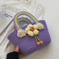 Purple woven tote bag with rainbow handles and a yellow flower ornament detail - Purple
