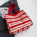 Red and white striped canvas tote bag with artistic paint stroke pattern and dual handles - Large / Red