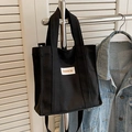Petit sac fourre-tout en toile noire avec étiquette FASHION et bandoulière réglable - Noir