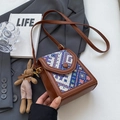 Ethnic crossbody phone bag in brown leather with geometric fabric and rabbit charm - Blue With Rabbit Pendant