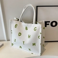 Sac fourre-tout en toile blanche avec imprimé lettres vertes et anses robustes - Blanc