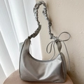 Metallic silver ruched underarm bag with decorative ribbon bow on the shoulder strap - Silver