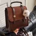 Vintage brown leather and suede patchwork backpack with a cute plush doll charm - Coffee And Brown With White Spirit Pendant