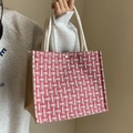 Pink and white woven tweed tote bag with rope handles and golden metal buckle closure - Red Rope Style