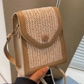 Handcrafted woven crossbody bag in natural straw with beige leather trim and flap cover - Khaki