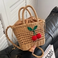 Handwoven straw crossbody bag with red knitted cherries and drawstring lining - Khaki Cherry