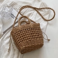 Handwoven straw crossbody bag featuring hollow-out patterns and a drawstring inner pouch - Plain Khaki