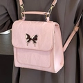 Sac à dos rose design pour femme avec grand ornement de papillon en métal argenté - Rose
