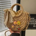 Handwoven semi-circle straw bag with floral accents and white lace bow detail - Khaki Flowers + Scarf