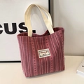 Chic pink corduroy tote bag for women with dual off-white woven handles and woven label - Rose Red