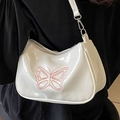 Bolso baguette blanco brillante con mariposa bordada rosa y detalles metálicos plateados - Blanco Roto