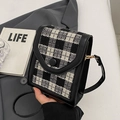 Fashionable black and white checkered crossbody phone bag with gold hardware and leather strap - Black