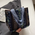Ethnic style woven tote bag with blue and orange geometric patterns and blue handles - Small / Blue