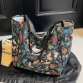 Schwarze Canvas-Tasche mit bunten Schmetterlingsmustern und dicken Seilgriffen - Bunter Schmetterling Jacquard (Schwarz) / Schwarz