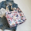 White canvas tote bag with colorful butterfly print and sturdy fabric handles - Large Pink