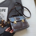 Vintage checkered canvas crossbody bag with dark brown leather trim and plush charm - Small Blue With Brown Pendant