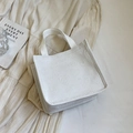 White canvas tote bag with embossed heart pattern for a minimalist aesthetic - Small Off-White
