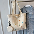 Off-white canvas tote bag with colorful embroidery and matching round coin purse - Off White