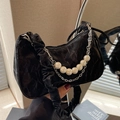 Chic black pleated velvet cloud bag featuring large pearls and silver chain strap - Black