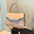 Quilted nude pink crossbody bag with heart embroidery and woven edge detail - Khaki