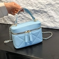 Light blue quilted leather crossbody bag with chain strap and gold-tone hardware - Blue