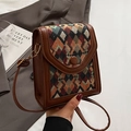 Vertical crossbody phone bag with brown leather trim and colorful geometric weave pattern - Green