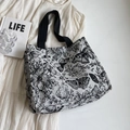 Chic knit tote bag featuring a vintage black butterfly print and sturdy wide straps - L Black