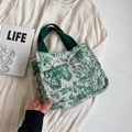 Compact canvas tote bag with green butterfly embroidery and stylish woven handles - Small Green
