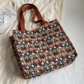 Borsa tote bohémien con motivo geometrico intrecciato arancione e grande capienza - Caffè Grande
