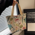 Retro cream canvas tote bag with colorful floral print and sturdy woven handles - Small Pink