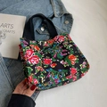Ethnic floral canvas tote bag with vibrant patterns and black sturdy handles - Black Small
