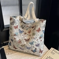 Grande borsa tote in tela con farfalle ricamate e robusti manici in tessuto - Beige Grande Potenziato