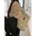 Beige striped canvas tote bag with wide handles and a minimalist side logo label - Off White