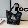 Grande borsa tote in tela con motivi a farfalla colorati e manici neri in tessuto - Nero Piccolo Potenziato