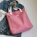 Borsa tote in tela rosa con manici bianco crema, tasche laterali e stile casual - Rosa (Ispessito)