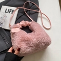 Plush pink crossbody bag with pleated faux leather handle and soft faux fur finish - Pink