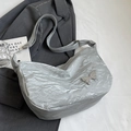 Silver metallic pleated hobo bag with a butterfly charm and adjustable shoulder strap - Silver