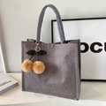 Minimalist grey linen tote bag for students featuring a plush cherry charm decoration - Khaki Cherry Charm / Gray