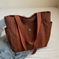 Brown corduroy tote bag with side pockets and canvas handles for daily autumn commute - Coffee