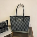 Fashionable black tote bag with silver M pattern and golden brand plate for daily commute - Black