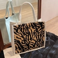 Canvas tote bag with black and yellow zebra stripes and white rope handles - Brown Zebra Print