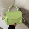 Lime green faux leather saddle bag with gold logo and adjustable shoulder strap - Green