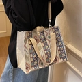 Ethnic style woven tote bag featuring geometric patterns with beige fabric top handles - Ribbon Style (5691259004856) / Khaki